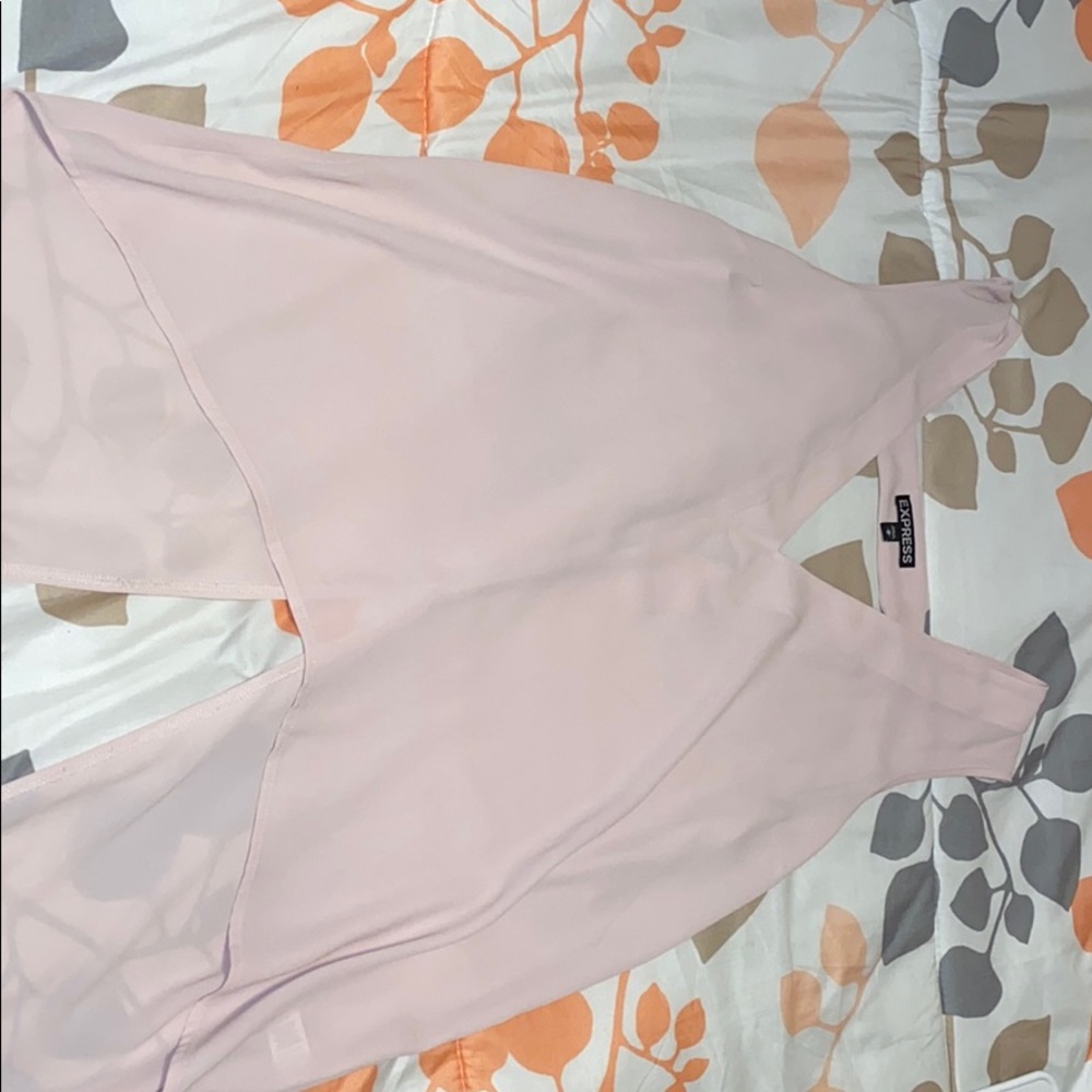 Pink opened back express top.